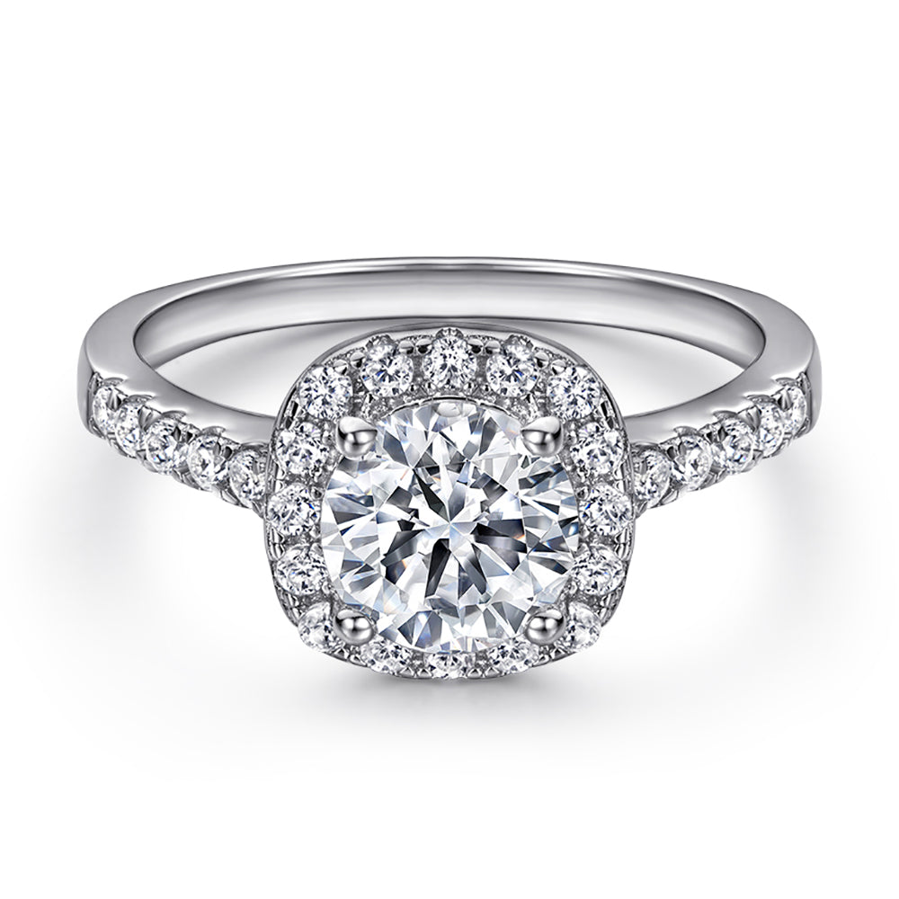 Silver ring with a diamond on a white background