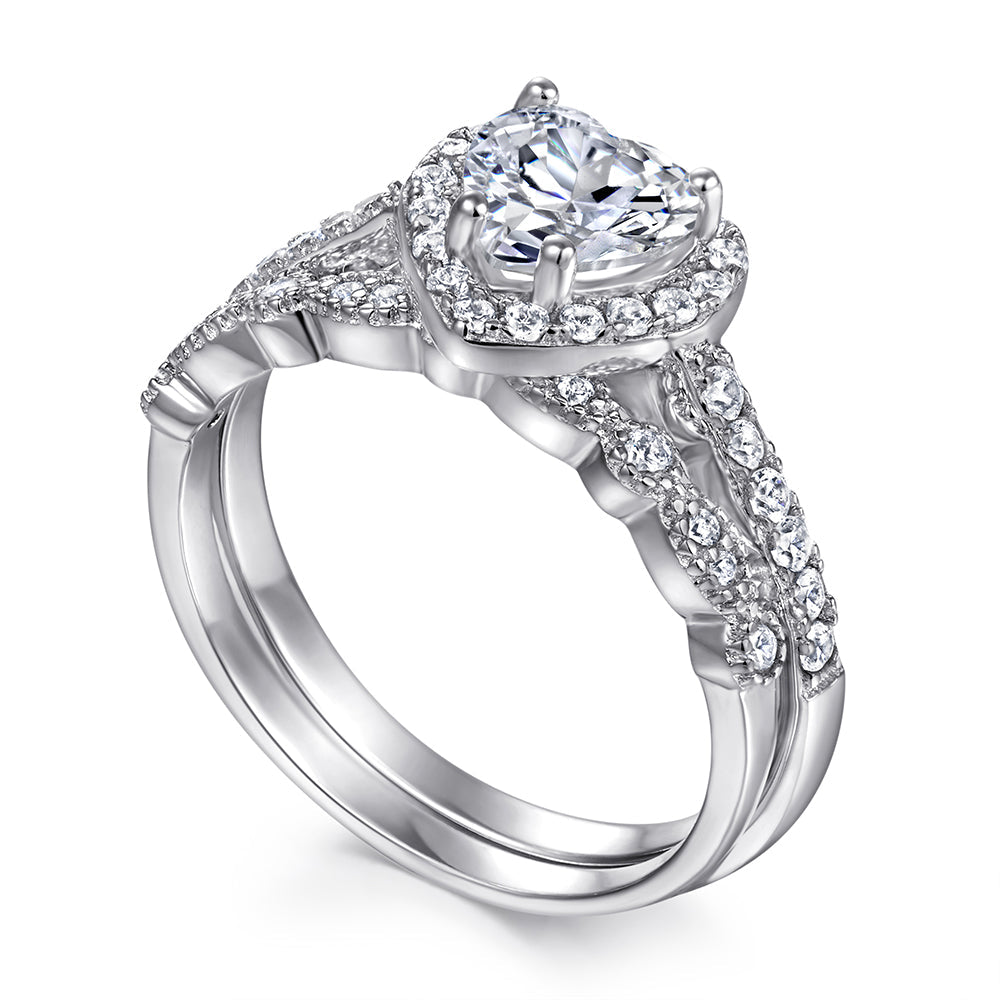 Silver ring with diamond accents on a white background