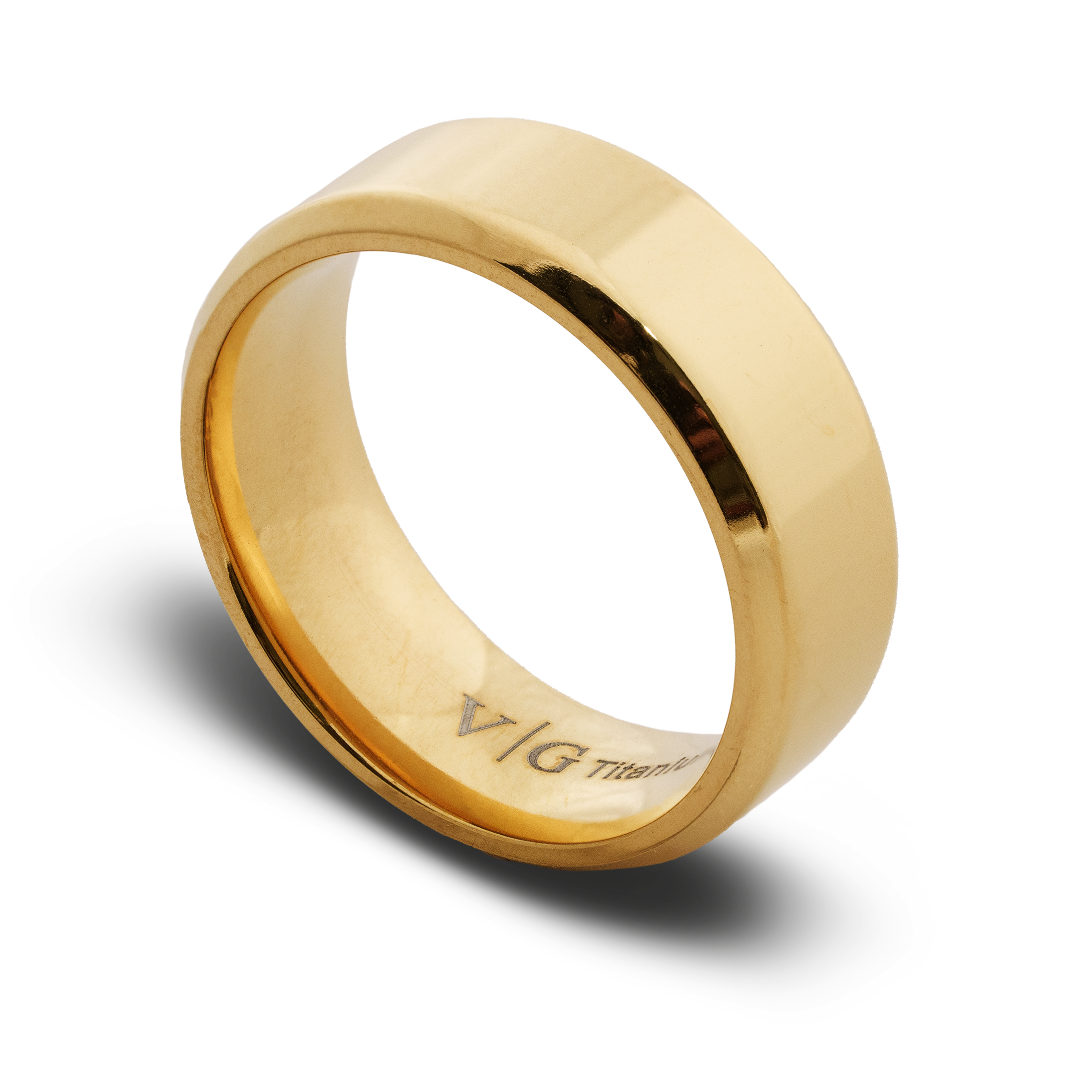 Gold ring with 'V/G Titanium' engraving on a white background