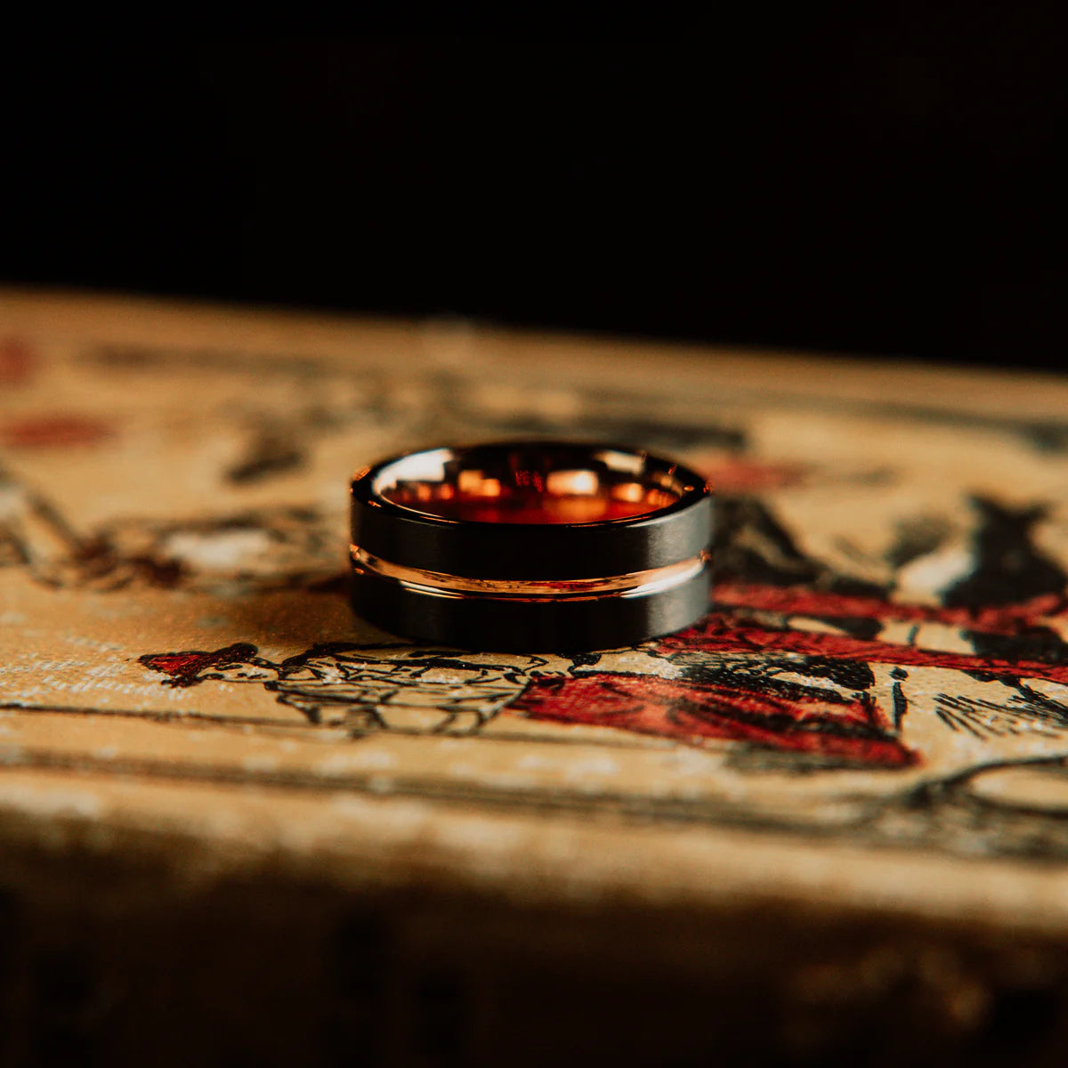Two rings on an old, illustrated book