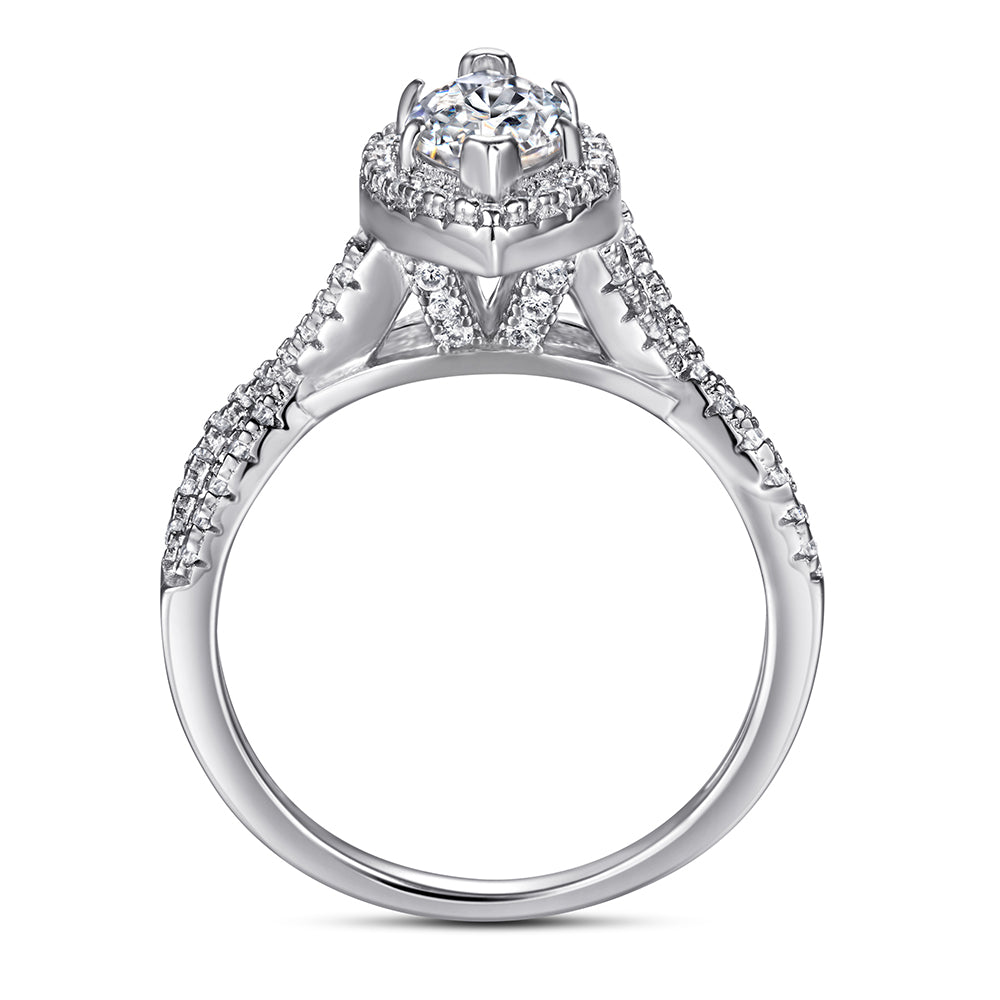 Silver ring with diamond accents on a black background