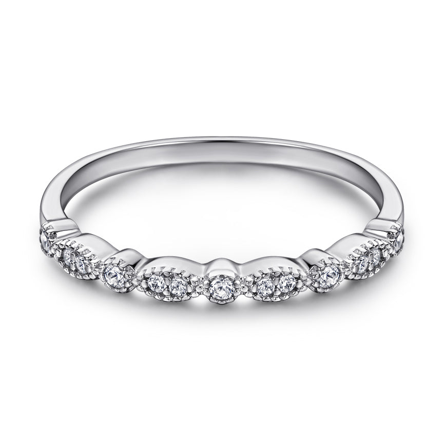 Silver ring with small diamonds on a white background