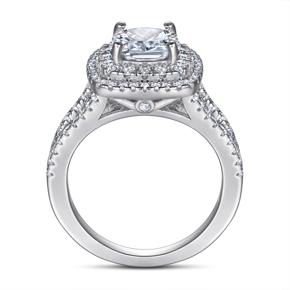 Silver ring with a diamond on a white background