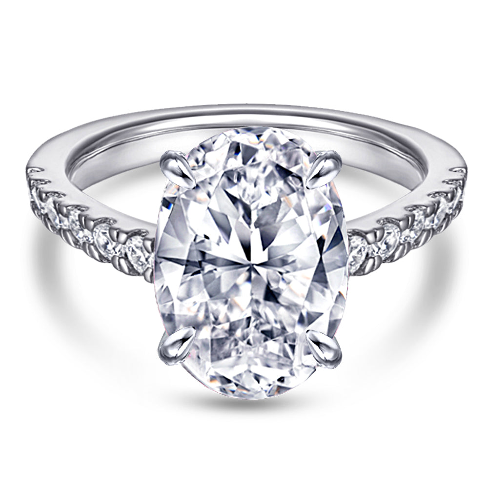 Silver ring with a large diamond on a white background