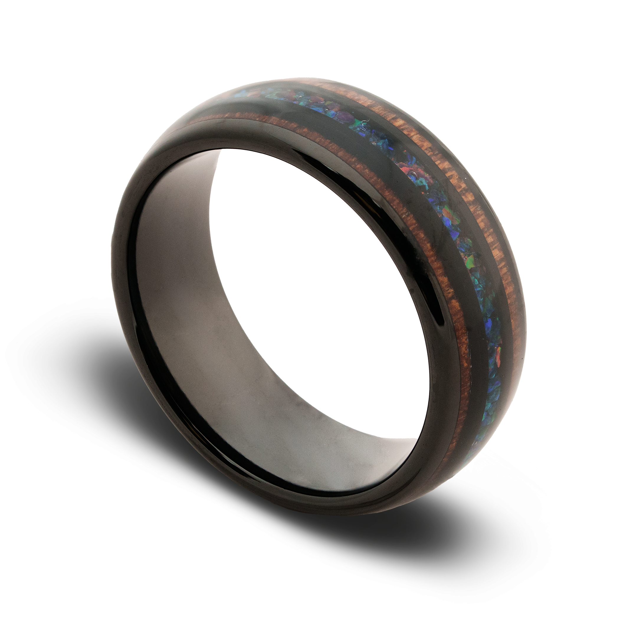 Black ring with multicolored inlay on a white background